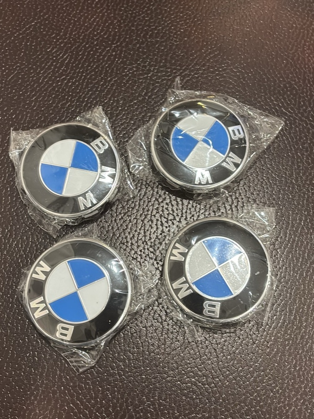 BMW Black, Blue & White wheel hubcaps 68mm.